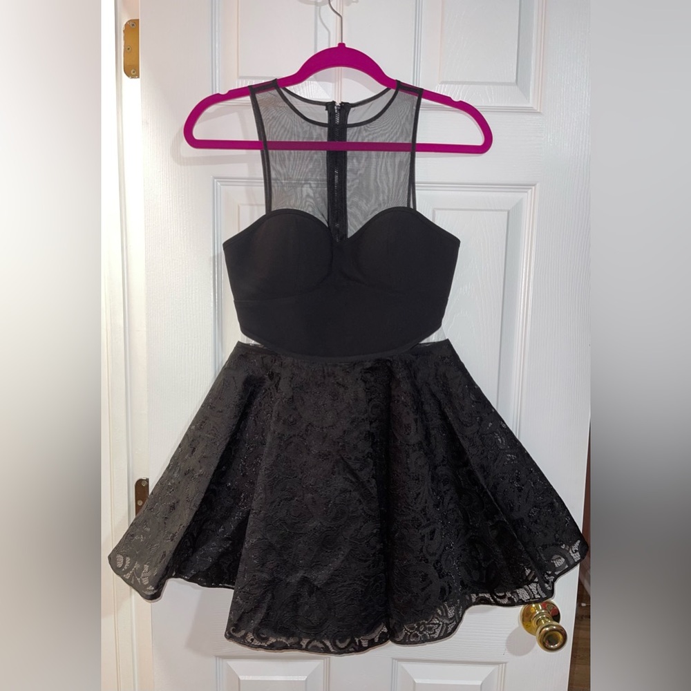 Brand: Bebe  Style: Mini Dress 👗  Size: 2  Color: Black